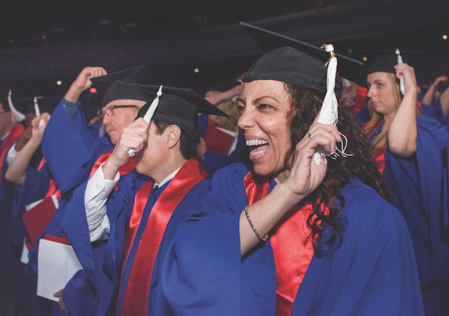 Adult learners celebrate graduation at DePaul University in Chicago. The school has focused on simplifying the application and admissions process to accommodate “nontraditional” students.