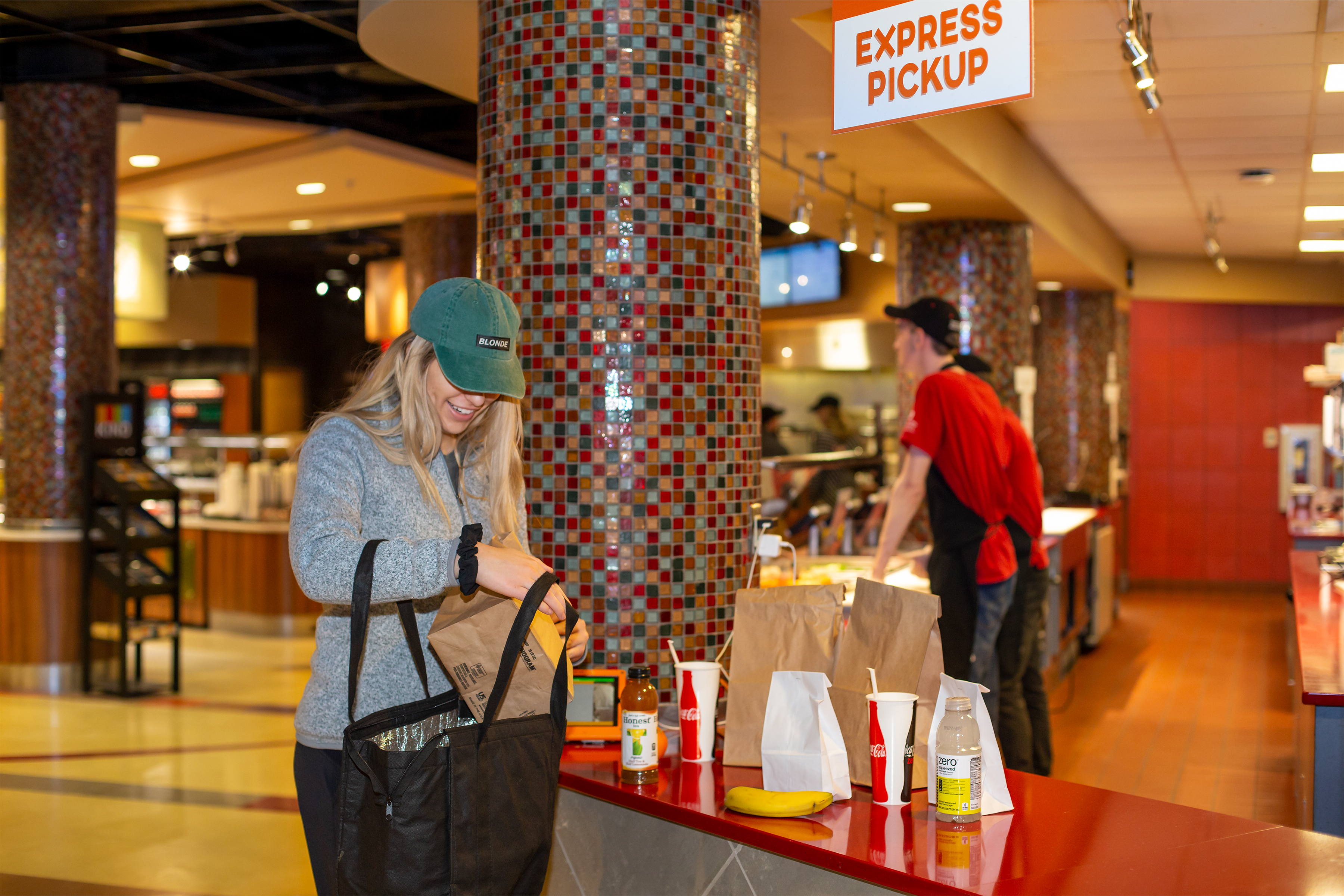 MEAL TO GO—On peak days at Ohio State U, about 8,000 mobile food orders are placed via an app, which estimates order pickup time so students can be in and out quickly.