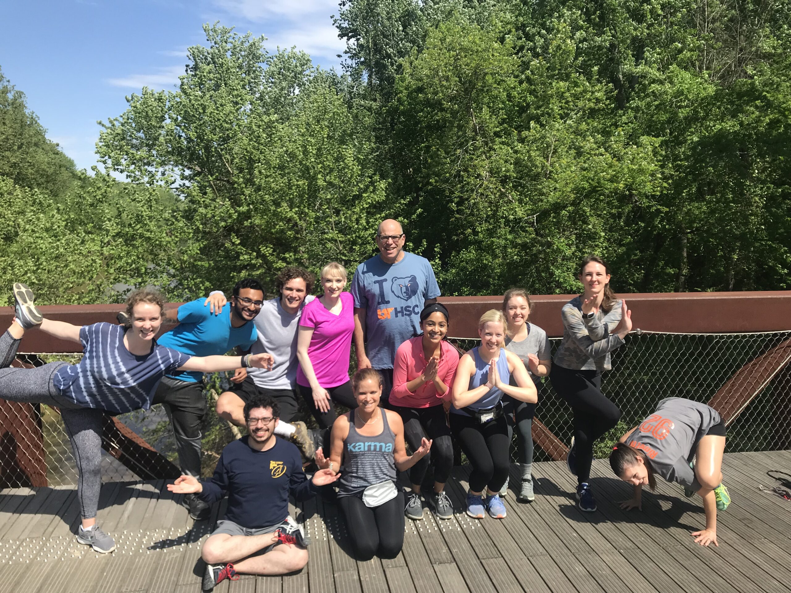 Finding their breath—Kimberlee Strome (seated), director of Mind Body Wellness at UT Health Science Center, plans YOGAhikes featuring yoga practice in between fast hiking bursts.