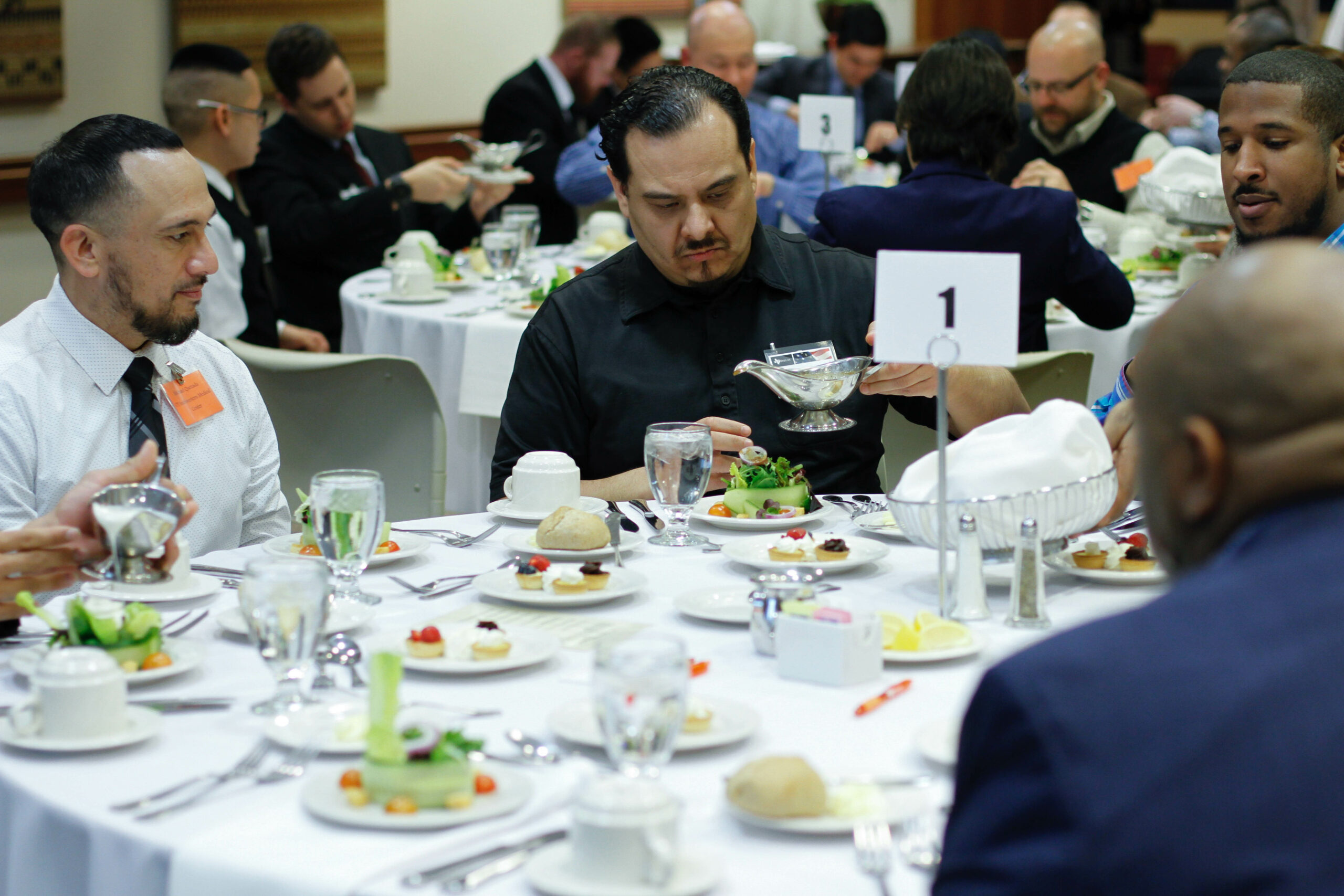 Veterans at The University of Texas at Dallas get to network with corporate recruiters while receiving some guidance on business-meal etiquette at the school's VETiquette dinners.