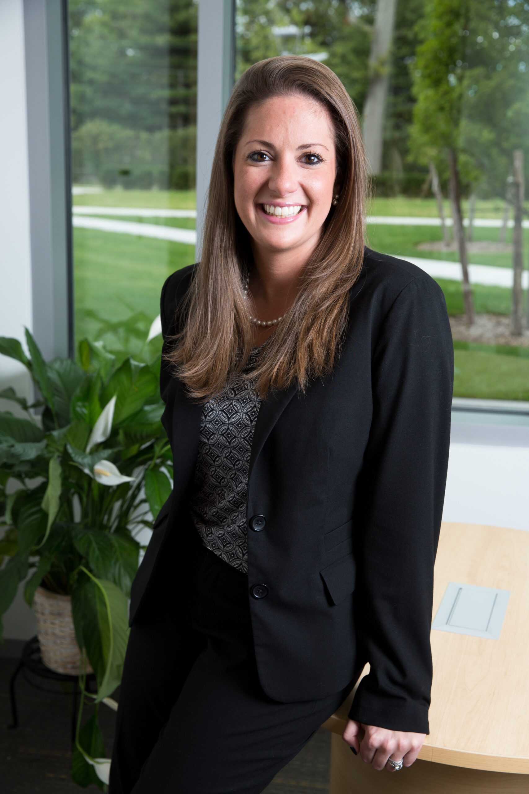 Kristen Capezza is vice president of enrollment and university communications at Adelphi University in New York.