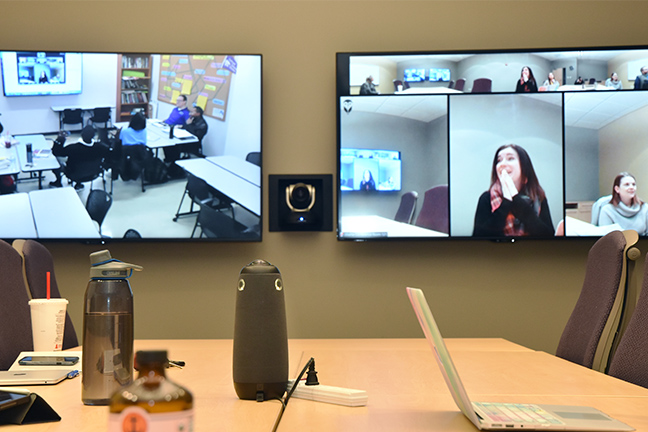 At Kansas State University's Olathe campus, several rooms are equipped with automatic tracking cameras and ceiling mics, which means presenters don’t have to worry about attaching lapel mics or using other devices.