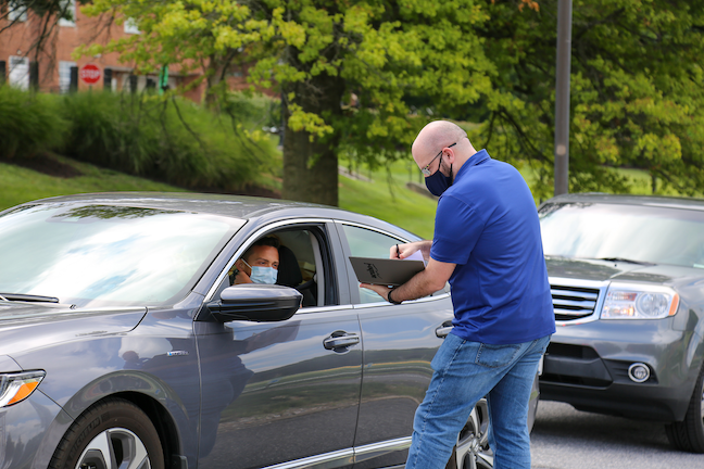 During this week’s move-in at McDaniel College, students reserved an arrival time and then remained in their cars as they checked in for fall the semester at the school’s stadium.
