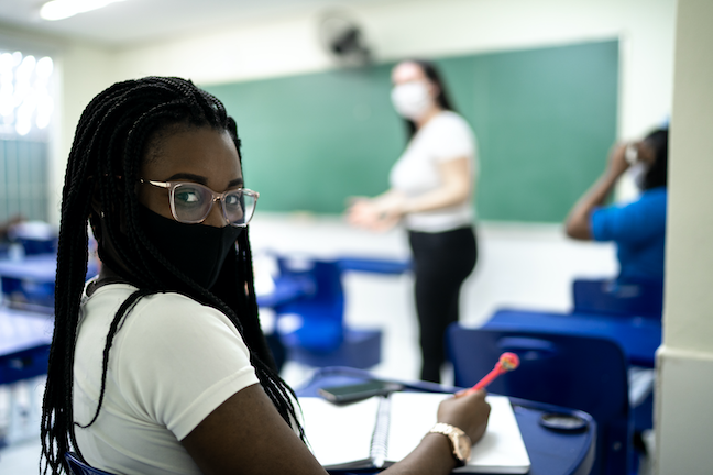 Free college programs at two year schools increase enrollment of Hispanic females by 52%; Black females by 51%; Black males by 47%; and Hispanic males by 40%. (GettyImages/FG Trade)