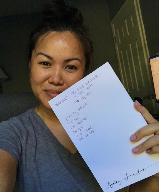 An Excelsior employee shows her workout log during a four-week employee competition of exercise, eating healthy, sharing gratitude and raising money for those impacted by heart disease.