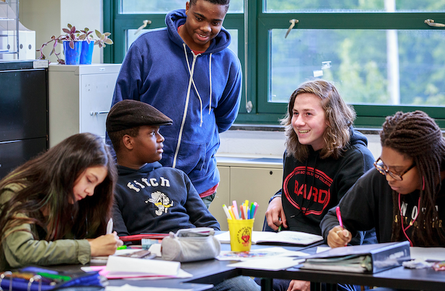 Students work together at the Bard High School Early College Baltimore. (photo taken pre-COVID)