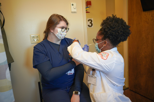 Students deliver COVID vaccines at the University of Tennessee Health Science Center.