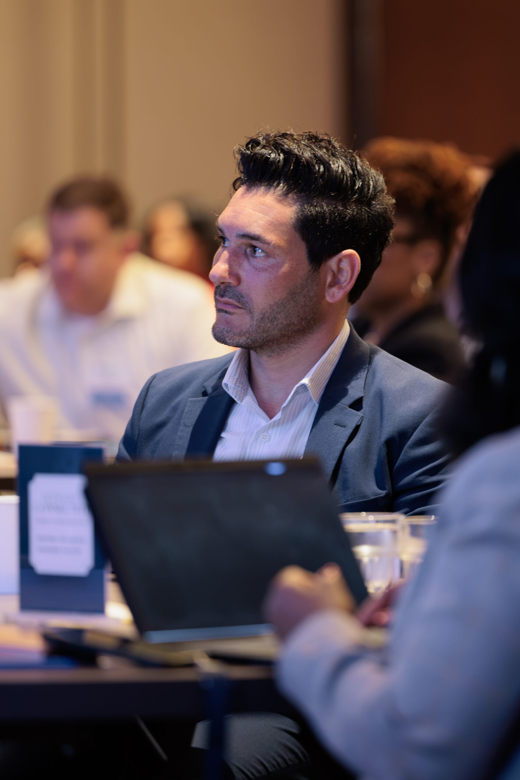 Summit attendee in session